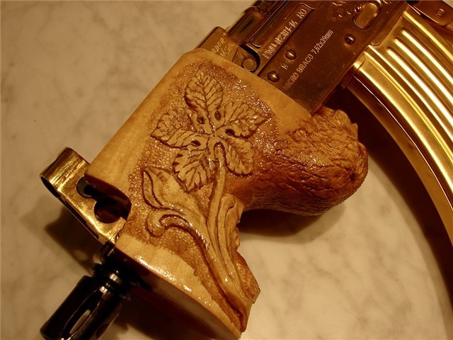 gunrunnerhell:  Bling?I think this started off as a Romanian Micro Draco Pistol but