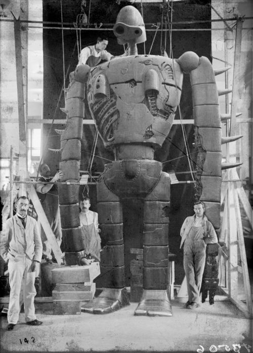 In a steampunk laboratory long ago or Robot in Real Life from Castle In The Sky
