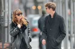 everythingdakotajohnson:  Dakota Johnson and boyfriend Matt Hitt out and about in New York on 18th December, 2014. 