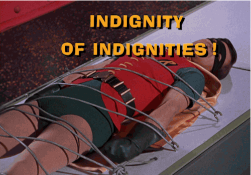 heroperil:Batman - The Joker’s Last Laugh / The Joker’s EpitaphSeason 2, Episodes 47/48After getting KO’d by Joker’s robots (see link below), Robin awakes to find himself strapped to a comic book printing press.    Joker and his Robots physically