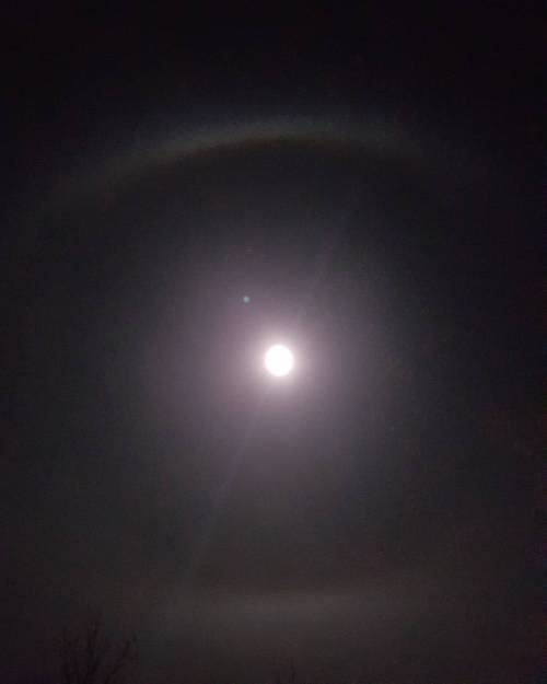 No snow tonight, but there is a weird rainbow like ring around the moon.
