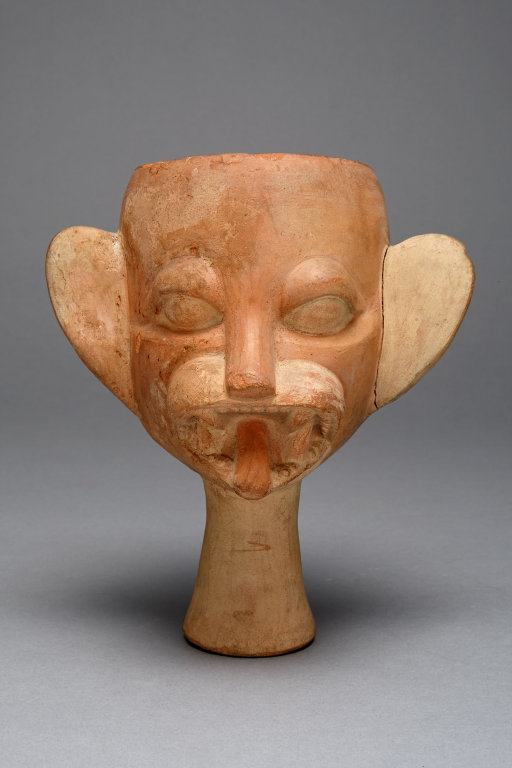 ~ Cup in the Form of a Feline Head.
Date: 100 B.C./ A.D. 500
Culture: Moche
Place of origin: North coast, Perú
Medium: Ceramic and pigment