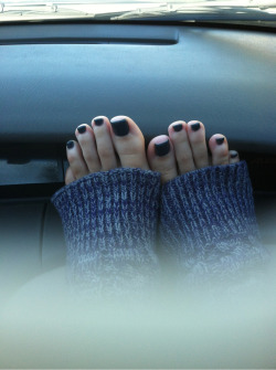 thelustnscroll:  My lady took a sexy pic of her yummy toes when I was driving. I know you all like them, because I love those toes!