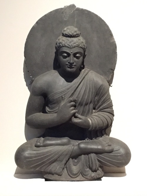 Sculpture of Buddha preaching, in the Gandhara style.  Artist unknown; prob. 2nd cent. CE.  Found at