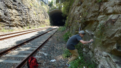 Decorating rocks outside tunnels