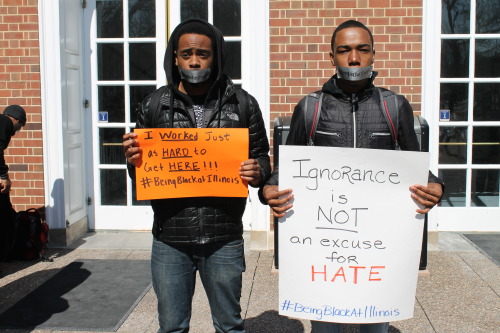 yo-tori:  kadyroxzwhat:  boobsanddimples:  l20music:  beingblackatillinois:  Several University of Illinois Students gathered on the quad for a silent protest against the oppressive remarks made to Black students.  Love this. I wanna see more of these