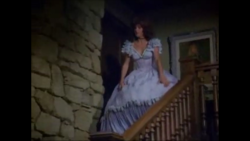 stoneelegance:    Stefanie Powers in Hart to Hart, who often seemed to get tied up - especially in the Girl from Uncle. This time in a great dress.