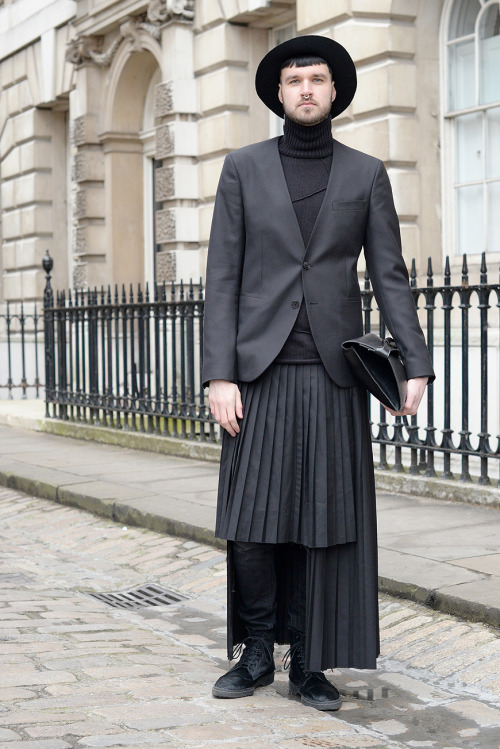 wgsn:Proving that all black is far from all bland at #LFW #AW15. WGSN street shot, London Fashi
