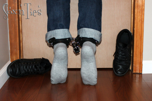 soxnties:  He likes these over the door wrist restraints more than I do… Even on tiptoe I couldn’t get loose… The hotter part came later when he ballgagged me and left me there to hang around for awhile, drooling… 