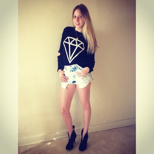 Diamond sweater with cutouts: Forever 21 Vintage acid washed high waisted shorts: Forever 21 Booties