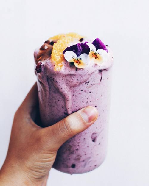 berriesflowersandsparkles:Old pic of an overflowing blueberry banana ice cream glass + orange, pomeg