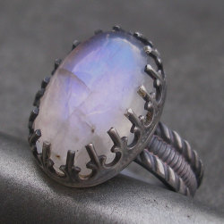 motionoftruth:  Moonstone Ring. Blue Moonstone Oval Cabochon and Sterling Silver. Fancy Bezel. US Size 5.5 by lsueszabo 