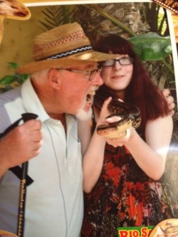 thatsreallyproblematic:  64bitwar:  brbcheckingmyprivilege:  Me holding a snake(boa constrictor) and my grandad pretending to eat him :p  Holy shit your grandpapi is the original Jurassic Park owner that’s awesome.  Your grandpa is problematic bc he