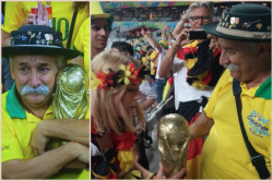 sunflowerscript:  wnyc:  This sad Brazilian fan was shown crying. But no ones published this beautiful picture of him handing the trophy to a German fan. He was quoted as saying &ldquo;Take it to the final! As you can see, it is not easy, but you deserve