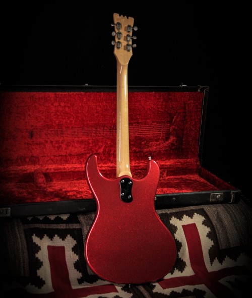 1966 Mosrite Ventures Model in Red Sparkle from:  www.rumbleseatmusic.com/