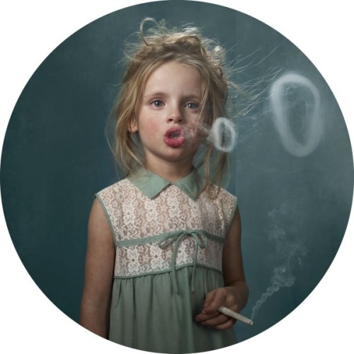 conveyerofcool:   Cool Photography: Smoking Kids Photographer Frieke Janssens poses young children with cigarettes. “I wanted to isolate the viewer’s focus on the issue of smoking itself. I felt that children smoking would have a surreal impact upon