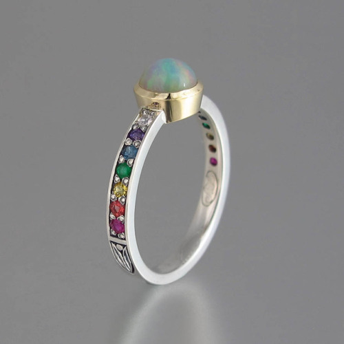 Ring in rainbow colors: Ethiopian opal, ruby, orange sapphire, yellow sapphire, emerald, blue topaz,