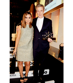 fyjennalouisecoleman:  Jenna Coleman and Peter Capaldi, winner of the TV Personality of the Year award, attend the GQ Men Of The Year awards in association with Hugo Boss at The Royal Opera House on September 2, 2014 in London, England. 