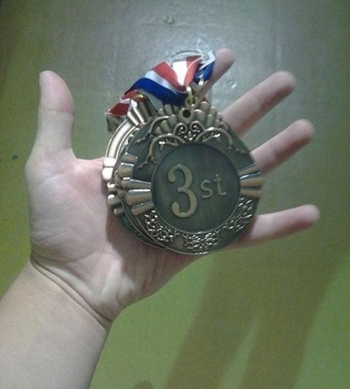 Hi Mom—I won a medal! I came in thirdst! adult photos