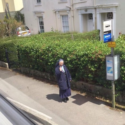 A #nun In The #sun. Made My Day Less Bad. Look At Her Waving! . . . . #nuninthesun #mademyday #waving