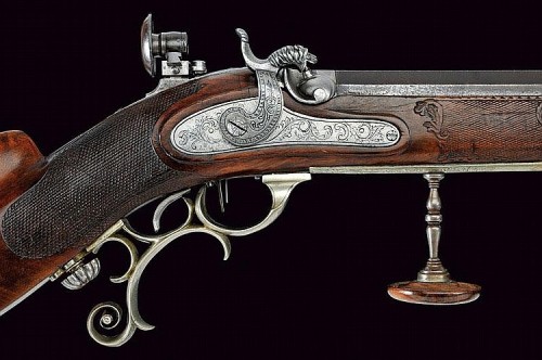 A silver mounted percussion target rifle originating from Switzerland, circa 1827.