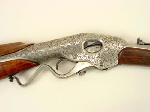 A rare L.D. Nimschke engraved Evans lever action repeating rifle, circa 1870’s.Sold at Auction: $30,