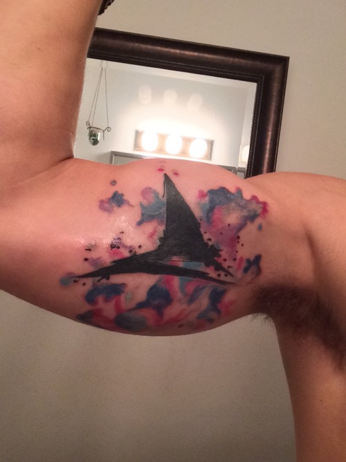 fuckyeahtattoos:  Watercolor tattoo with black shark fin. Done by Anthony at Inkpulsive Holbrook, New York 