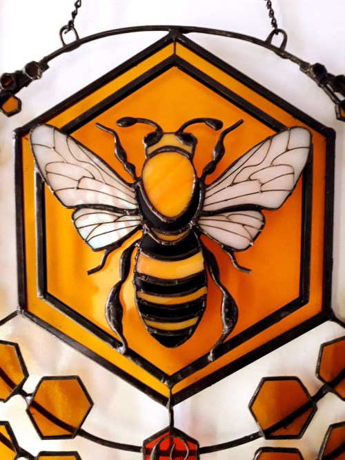 hyvetyrant:sosuperawesome: Glassbee on Etsy The queen bee stained glass…. I might NEED that.