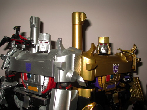 optimussurvivor:Masterpiece Megatron-standard and gold versionsha ha oh my god just look at that dis