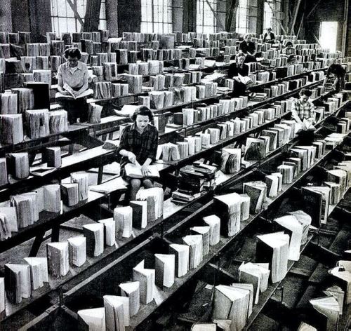 danismm:After a fire in the building, waterlogged books of the State Library Lansing Mich. were drie