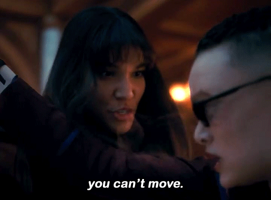 Gif continuation of the first gif. Allison finishes her sentence by saying 'You can't move'. Fei freezes in her movement