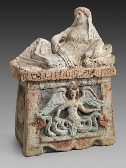 ancientpeoples:  Etruscan urn with decorated lid Etruscan urns are often decorated with mythological scenes and carved image of the deceased on top of the urn. The urn is made from limestone. 104 cm high and 75cm long (40 15/16 by 29 ½ inch).  Etruscan