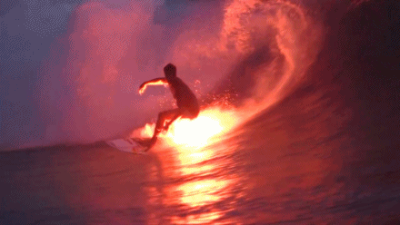 rainbowbarnacle:peoplemask:mymodernmet:Flare Surfing by Bruce IronsProfessional surfer Bruce Irons s
