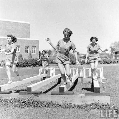 Running an obstacle course at Tulane(Myron Davis. 1942)