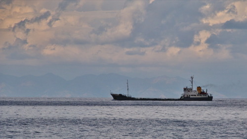 Commerce is the backbone of the world. Handel ist das Rückgrat der Welt.Trading ship near Rhodes, Tu