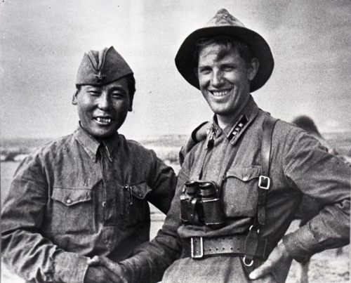Mongolian and Soviet soldier after their victory against the Japanese at the Battle of Khalkin Gol, 