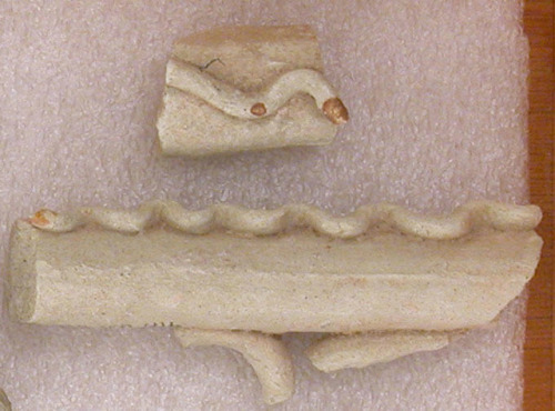 Fragment of a Handle with Wavy Band via Islamic ArtMedium: Earthenware; molded and appliedRogers Fun