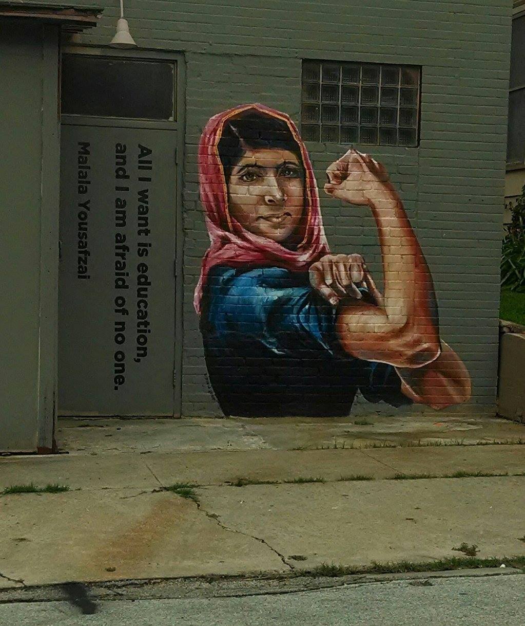 shepherdsongs:
“ I was driving past a business here in the Houston Heights, when I glimpsed this painted on the side of the building. I recognized that iconic WWII poster before I realized it was not just any woman, but 14 year old Malala Yousafzai,...