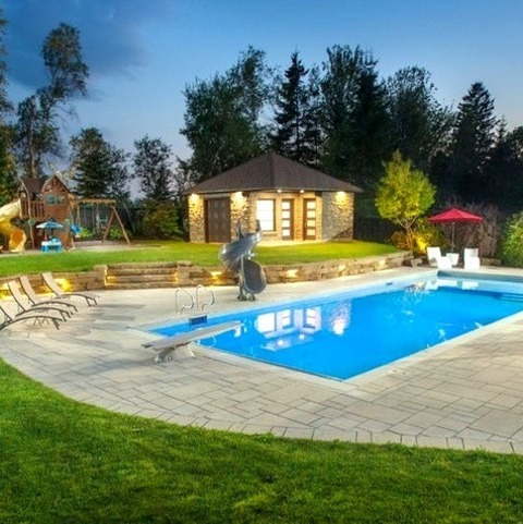 Traditional PoolExample Of A Huge Classic Backyard Concrete Paver And Rectangular Lap Pool House Design