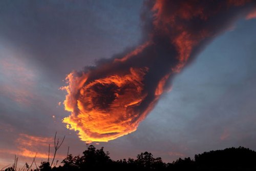 love:  The ‘Hand of God’ over Portugese horizon by Rogerio Pacheco