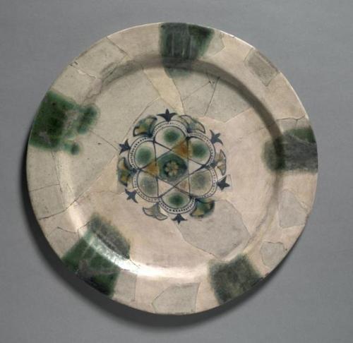 cma-islamic-art: Earthenware Dish Painted Blue with Splashes of Green and Yellow, 830, Cleveland Mus