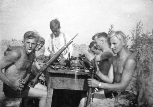 Eastern Front, cleaning guns, messing around.