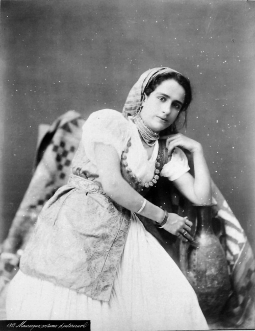 Algeria. Studio portrait of a woman dressed in a traditional Algerian Ghlila, 1880/1900.