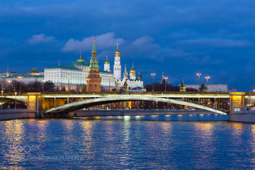 The Moscow Kremlin with night lights on during the evening sunset in the fall by FaST_9