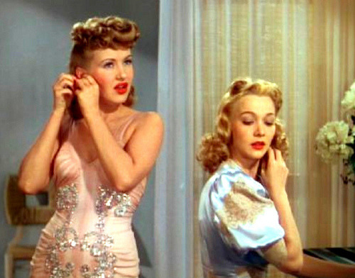 fancydancynancy:  vintage-fashionista:  Betty Grable and Carole Landis Moon Over