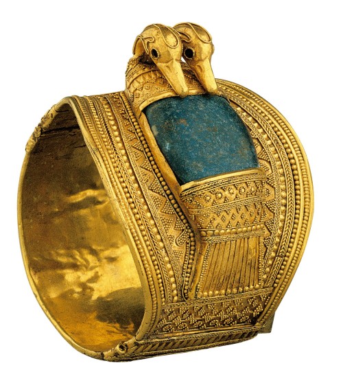 egypt-museum:Bracelet of Ramesses IIThe solid gold bangle is composed of two parts, linked on one si