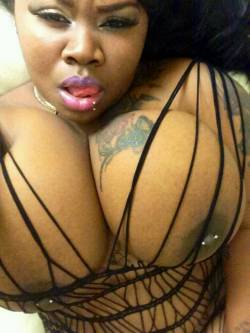 damann2118:  Wat have we here,netted, tatted big juicy boobies