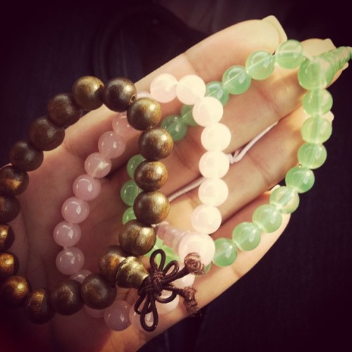 I’m bringing these bitches back#bracelets #goodwill #shopping #green #pink #wood #trendy #reme