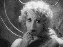 perfectmistake13:  Betty Compton taking a drag of her cigarette in 1928’s The Docks of New York.