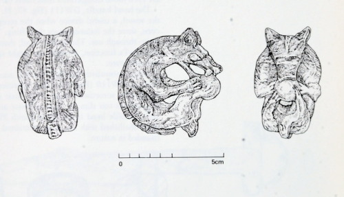 A possible depiction of the Viking wolf Fenrir from Dublin?This small wooden artefact was discovered